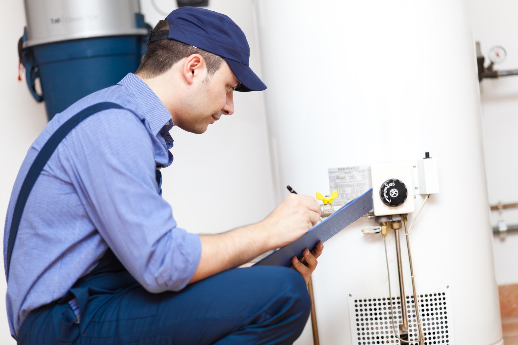 Technician Repairing Heater